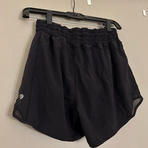 Lululemon shorts zipper pocket and adjustable waist band. Size 2